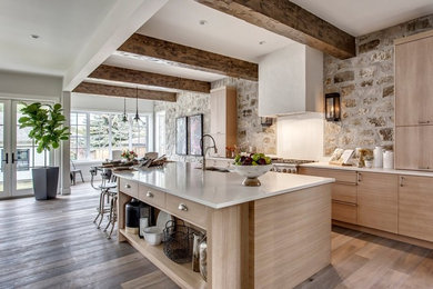 This is an example of a large country l-shaped kitchen pantry in Calgary with flat-panel cabinets, quartz benchtops, white splashback, medium hardwood floors, with island and white benchtop.