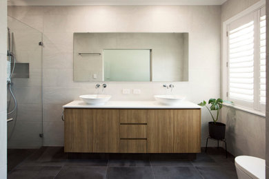 Mid-sized master bathroom in Other with flat-panel cabinets and a floating vanity.