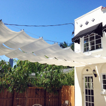 2 sections of 5 by 20 feet canopy featuring Premium Natural Sunbrella fabric