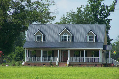 Beige two-story exterior home idea in Charleston