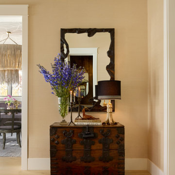 Minimalist Entry with Chest Style Cabinet & Artistic Mirror