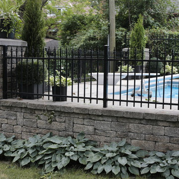 Field stone wall with Ornamental Iron Fence