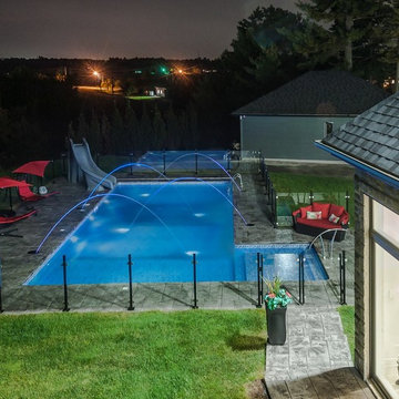 Hilltop multi level automated pool with lighted water features