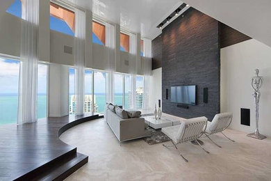 Example of a minimalist family room design in Miami