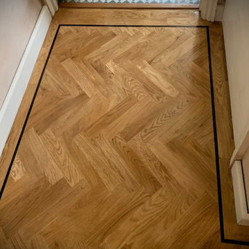 Herringbone design wooden blocks...Beautiful in this home...