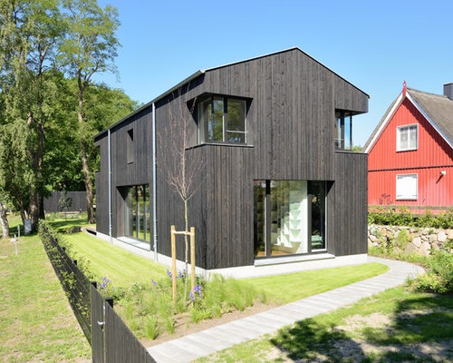 Schwarze Häuser und Fassaden mit Holzfassade: Ideen für die Haus