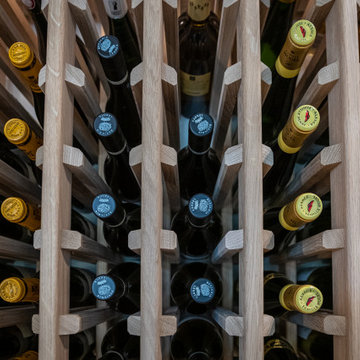 A Wine Cellar with a Black Frame