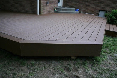 Inspiration for a mid-sized traditional backyard patio in Seattle with decking and no cover.