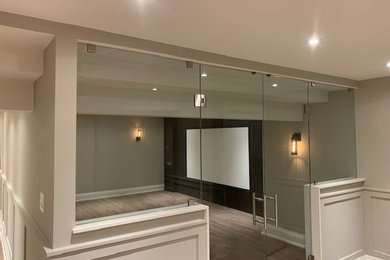 Inspiration for a contemporary home theater remodel in Toronto