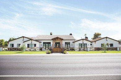 Inspiration for a huge country home design remodel in Phoenix