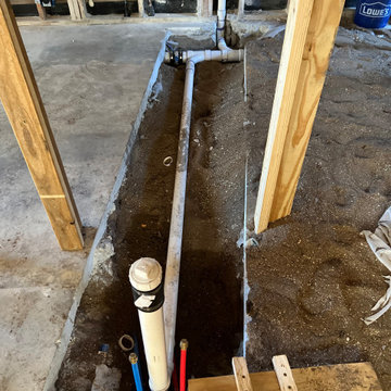 Relocation of the sink from the exterior wall to the new peninsula