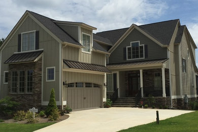 Mid-sized transitional beige two-story wood gable roof photo in Atlanta