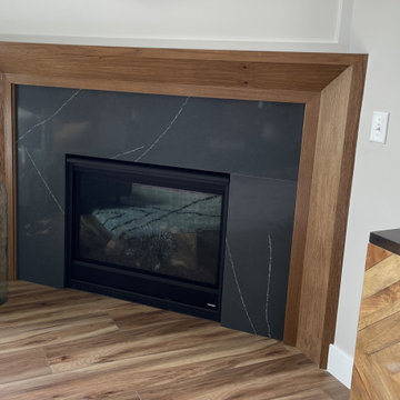 Angled Kitchen Design with Slab Style Cabinets in Pecan Stain