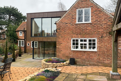 Two storey contemporary copper extension added