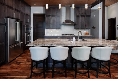 Kitchen - mid-sized rustic kitchen idea in Other