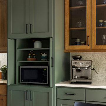 Custom Two-Tone Kitchen Cabinetry with Appliance Niche
