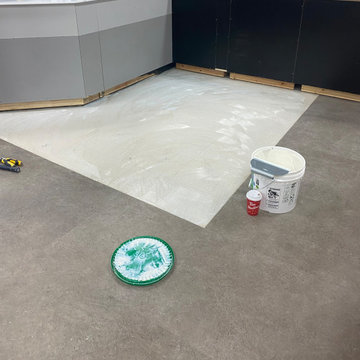 Staples Renovation; mix of mudding, taping, flooring, and painting