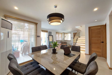 Example of a dining room design in Other