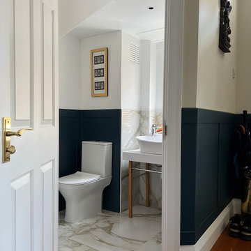 Marble and Blue cloakroom with panelling