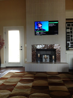 Reface a floor-to-ceiling brick fireplace