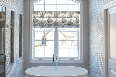 Large transitional master gray tile and marble tile marble floor bathroom photo in Chicago with shaker cabinets, gray cabinets, a two-piece toilet, brown walls, an undermount sink and marble countertops