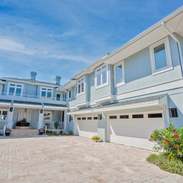 Expansive Two-Story Coastal Luxury Home With Elegant Architectural Detailing