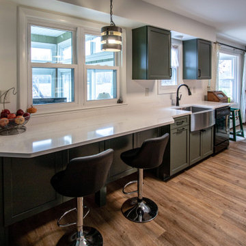 Painted Sage Kitchen with Carrara Breve Quartz countertops