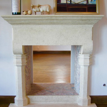 Neo Gothic Style hand-carved stone fireplace.