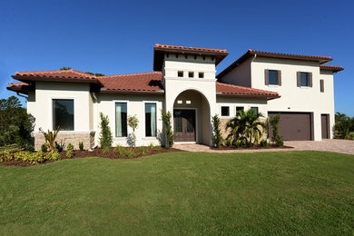 Tuscan exterior home photo in Orlando