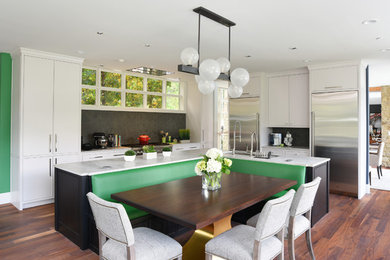 Large minimalist l-shaped medium tone wood floor eat-in kitchen photo in Columbus with an undermount sink, gray backsplash, porcelain backsplash, stainless steel appliances, an island and white countertops