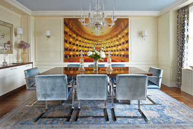 Dining room - transitional medium tone wood floor dining room idea in New York with beige walls