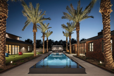 This is an example of a contemporary brick house exterior in Phoenix.