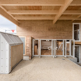 札幌のインダストリアルスタイルのおしゃれな玄関の写真