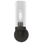 Livex Lighting - Ludlow 1 Light Black ADA Single Sconce - Add a dash of character and radiance to your home with this wall sconce. This single-light fixture from the Ludlow Collection features a black finish with a clear glass. The clean lines of the back plate complement the cylindrical glass shade creating a minimal, sleek, urban look that works well in most decors. This fixture adds upscale charm and contemporary aesthetics to your home.