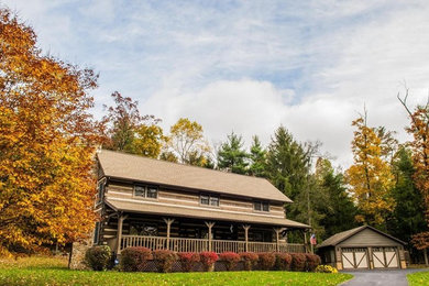 Rustic exterior home idea in Other