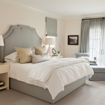 A dreamy master bedroom of creams and pale blues