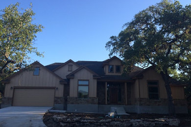 Rustic exterior home idea in Austin