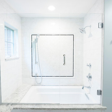 Traditional bath with tiled shower/tub combination