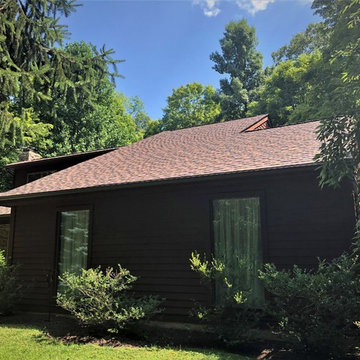 Installing Brown Wood Owens Corning Shingle Roof on Gable Style Roof in PA