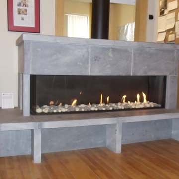 Ortal linear gas fireplace with Soapstone enclosure