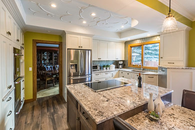 Photo of a modern kitchen in Calgary.
