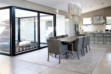 Inspiration for a contemporary dining room remodel in Other