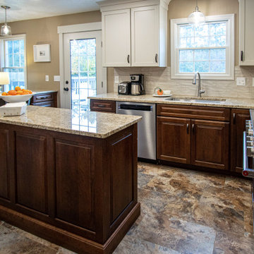 Two Tone Kitchen White Cabinets with Wood Island with Granite Countertop