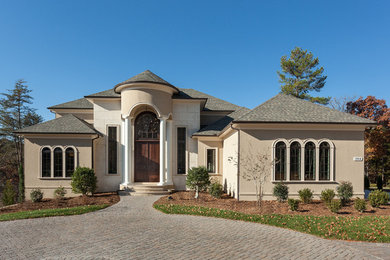 Example of a tuscan home design design in Charlotte