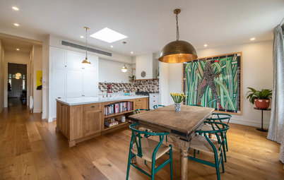 Room of the Week: A Colourful Wood Kitchen With Art at its Heart