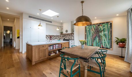 Room of the Week: A Colourful Wood Kitchen With Art at its Heart