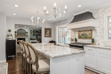 Kitchen - large french country u-shaped kitchen idea in Columbus with an island