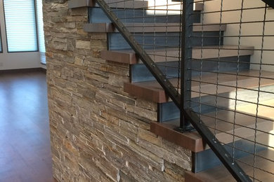 Example of a mountain style staircase design in Salt Lake City