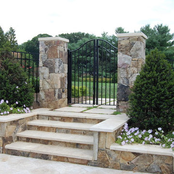 Western Maryland Wall Stone Retaining Wall with Custom Travertine Cap