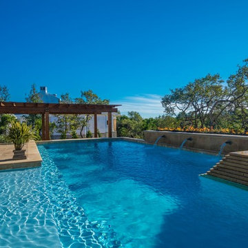 Contemporary Pool with Firewall and Scuppers in San Antonio, TX  Siggi Ragnar-Ph